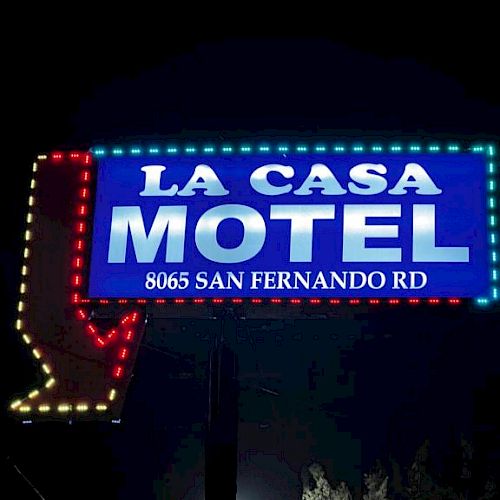 A neon sign at night for 